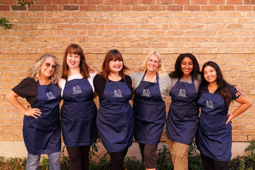 The Aunt Beth’s bakery team together in navy aprons